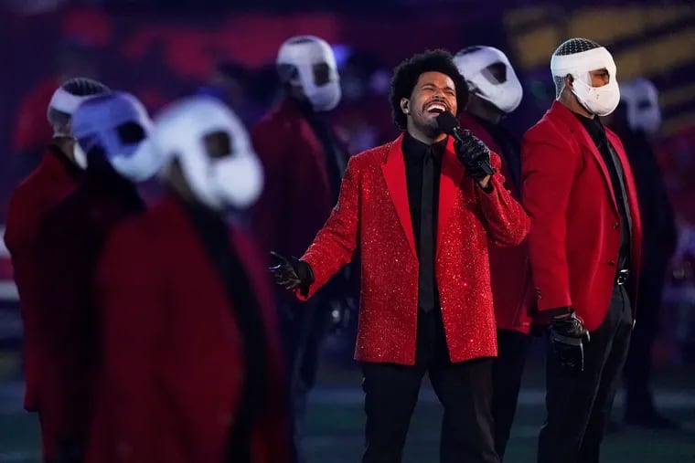 The Weeknd performs during the halftime show of Super Bowl 55 football on Sunday, Feb. 7, 2021, in Tampa, Fla. He is scheduled to bring his 'After Hours' tour to the Wells Fargo Center in South Philadelphia in April 2022.