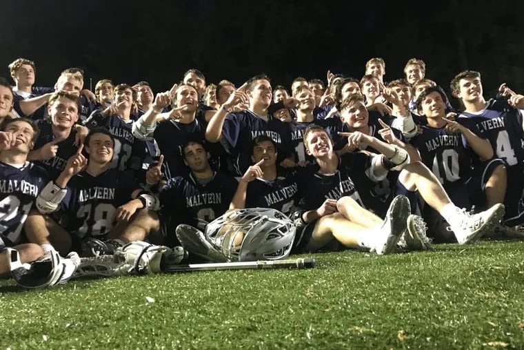 The Malvern Prep boys’  lacrosse team gathers for a group photo after beating Haverford School, 17-13, Monday at Cabrini University for the Inter-Ac title.