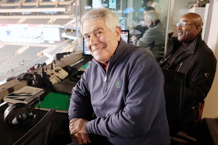 Eagles radio announcers Merrill Reese (in foreground) and Mike Quick getting ready for their broadcast of the Dallas Cowboys-Eagles game at Lincoln Financial Field on Jan 8.