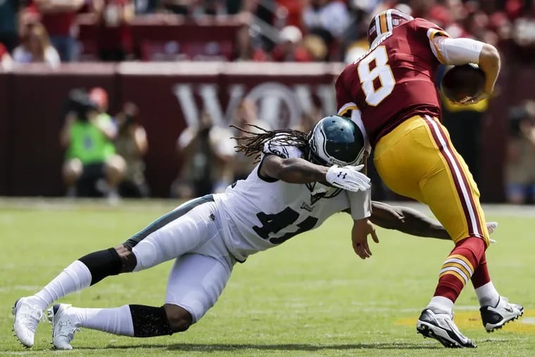 Eagles cornerback Ronald Darby goes after Washington quarterback Kirk Cousins in Sunday’s 30-17 win.