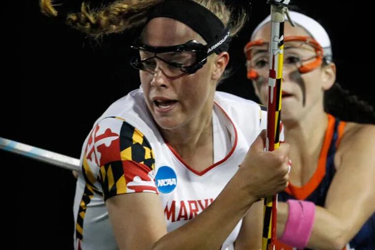 Maryland's Alice Mercer avoids the pressure from Syracuse's Devon
Collins in NCAA Women's Lacrosse Final Four at Villanova on Friday,
May 24, 2013. (Ron Cortes/Staff Photographer)