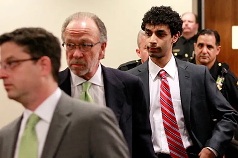 Dharun Ravi at his May hearing on invasion-of-privacy charges involving Rutgers roommate Tyler Clementi, who committed suicide. The case, still being sorted out, inspired the new law. (Julio Cortez / Associated Press)