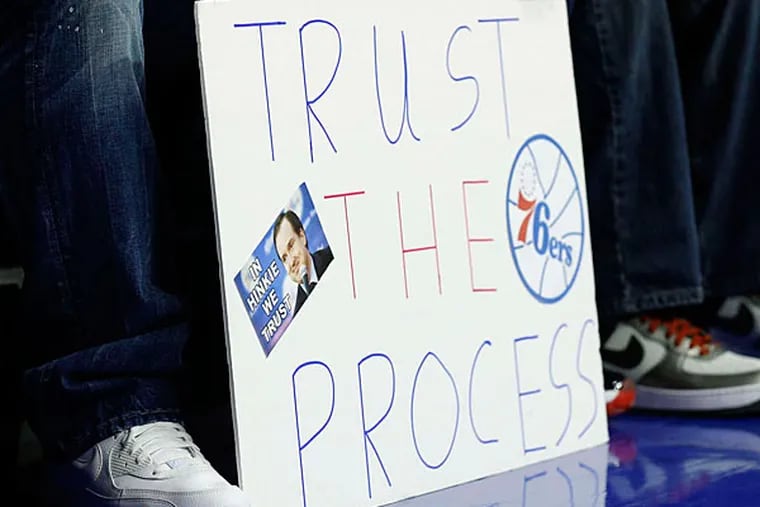 A Sixers fan shows support for Sam Hinkie's plan during last night's game at the Wells Fargo Center.