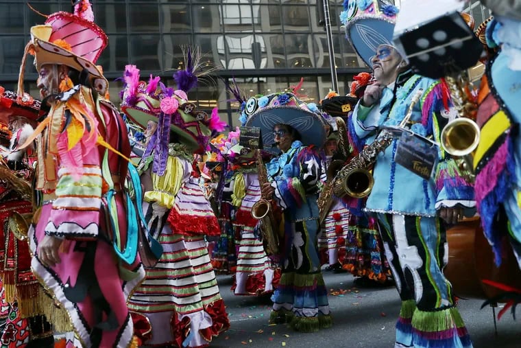 Durning String Band members wait to perform in front of City Hall during the annual Mummers Parade in Philadelphia on Wednesday, Jan. 1, 2020.