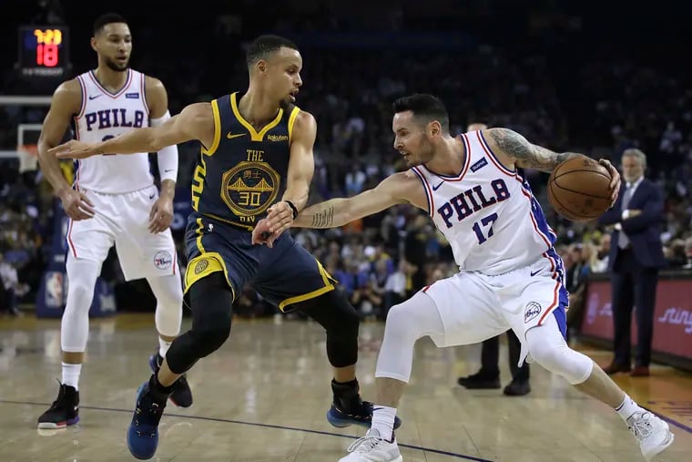JJ Redick (right) working against the Warriors' Steph Curry during the first half Thursday night.
