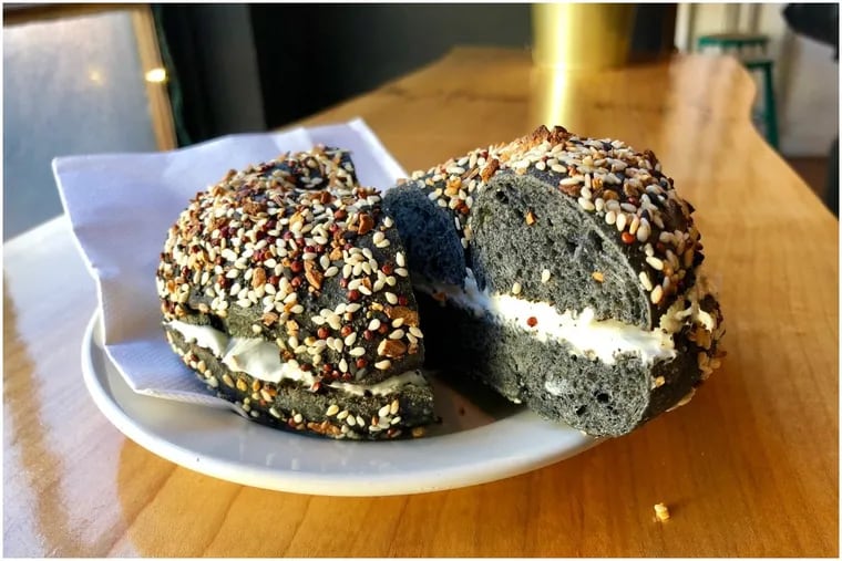 Where did Craig LaBan eat this black everything bagel made with activated charcoal?