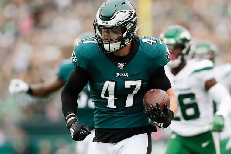 Eagles linebacker Nate Gerry runs back his interception for a touchdown against the New York Jets during the first-quarter on Sunday, October 6, 2019 in Philadelphia.