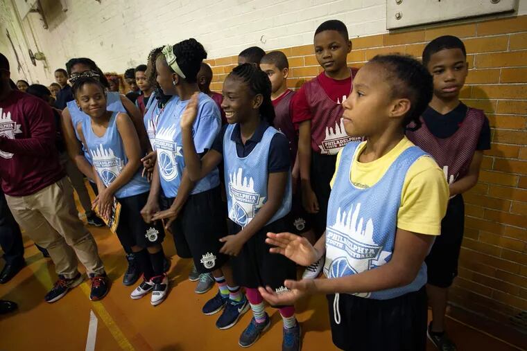 A group of Philadelphia Youth Basketball players were there for the announcement at Cooke School, where area residents spoke of their hopes for the neighborhood.