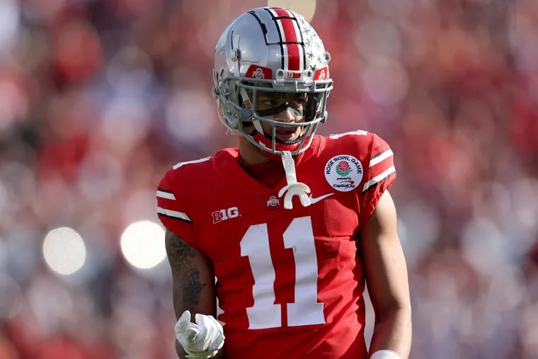 Ohio State wide receiver Jaxon Smith-Njigba is the odds-on favorite to be the first wide receiver taken in the 2023 NFL Draft. Smith-Njigba, who sat out most of last season with an injury, also is favored to be selected by the Houston Texans. (Photo by Harry How/Getty Images)