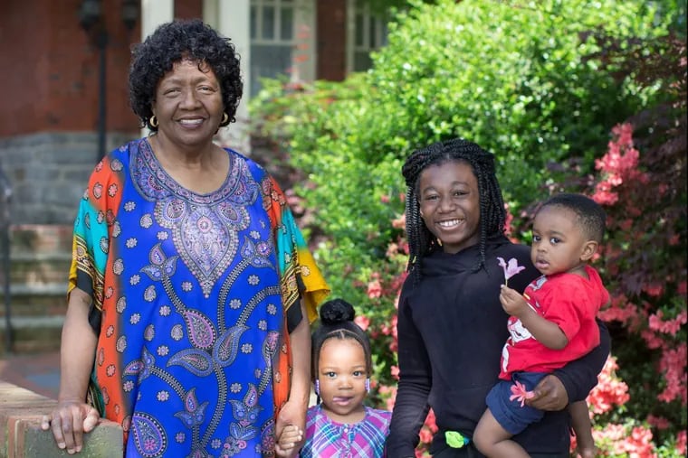 Sharonell Fulton has fostered more than 40 children. She plants a tree or rose bush in her front yard with her foster children as a symbol of their growth.