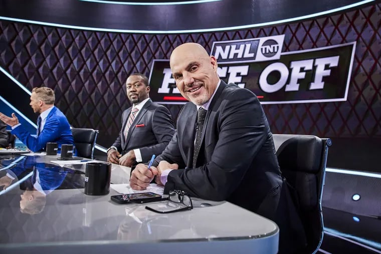 TNT analyst Rick Tocchet (right) on the set of the network's NHL studio show. Tocchet will be inducted into the Flyers' Hall of Fame on Tuesday night.