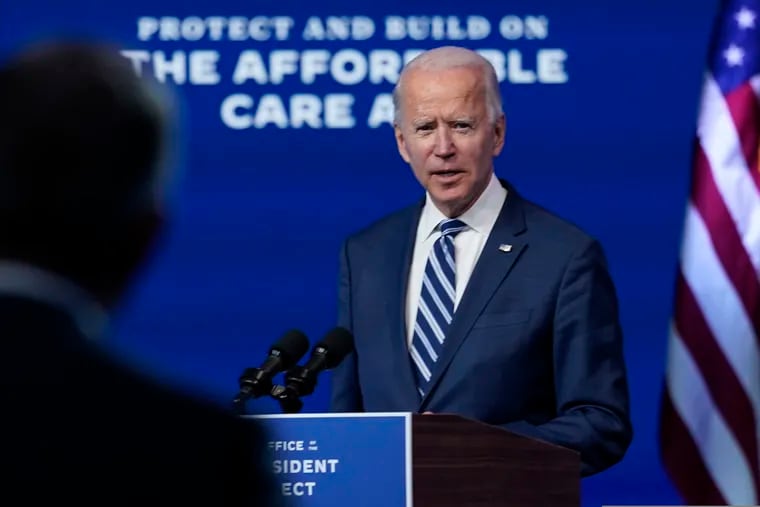 President-elect Joe Biden answers a reporter's question at The Queen theater, Tuesday, Nov. 10, 2020, in Wilmington, Del. (AP Photo/Carolyn Kaster)
