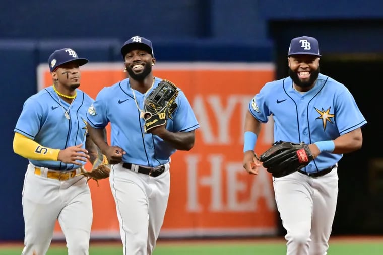 The Tampa Bay Rays are all smiles right now as they’ve started the 2023 season with 13 straight wins. If the Rays beat the Blue Jays in Toronto on Friday, they’ll become the first team in modern MLB history to start a campaign 14-0. (Photo by Julio Aguilar/Getty Images)