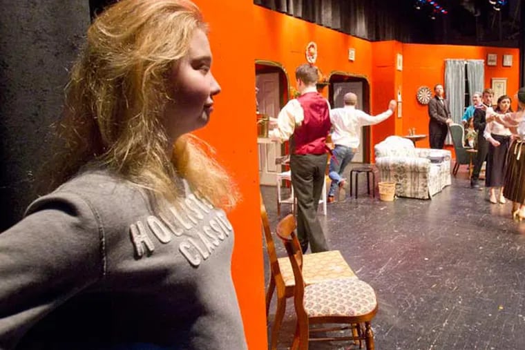 Rebecca Voltmer watches rehearsal of "You Can't Take It WIth You" at Abington Senior High.
