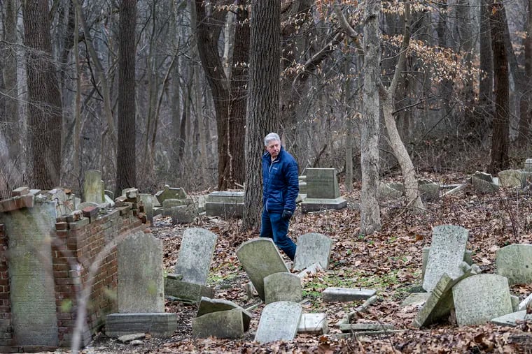 Neil Sukonik walks along the Beth David’s Jewish cemetery in Gladwyne. Sukonik is a member of a Friends group working to revive the historic cemetery and the grounds around it.