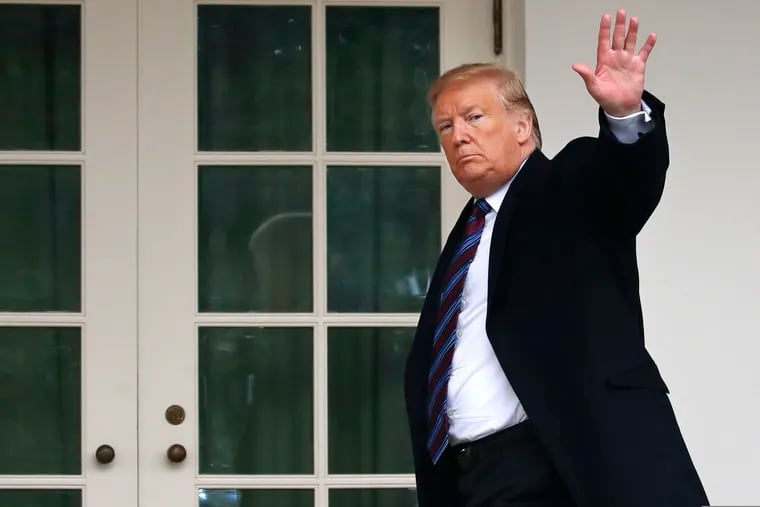 President Donald Trump waves as he leaves the Rose Garden of the White House after speaking and taking questions from the media after his meeting with Congressional leaders on border security, Friday, Jan. 4, 2019, at the White House in Washington.