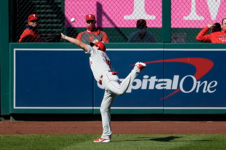Phillies left fielder Mickey Moniak cannot catch a ball hit by Washington's Juan Soto in the first inning. It was a sign of bad things to come.