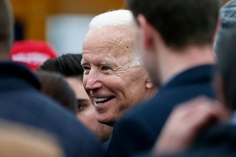 Former vice president Joe Biden talks with officials after speaking at a rally in support of striking Stop & Shop workers in Boston, Thursday, April 18, 2019. (AP Photo/Michael Dwyer)