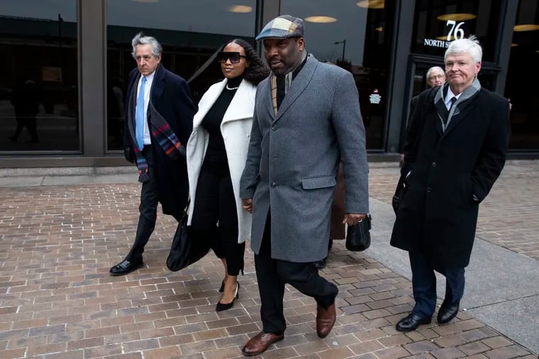 Dawn Chavous and Philadelphia City Councilperson Kenyatta Johnson leave the federal courthouse after pleading not guilty to federal corruption charges in January 2020.