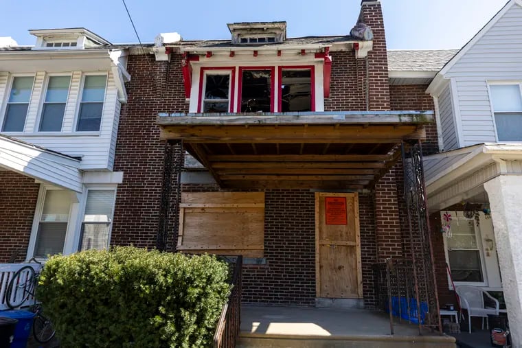The outside of a house that was destroyed by a suspected arson in Philadelphia, Pa., on March 21, 2024. The blaze ignited in March 2023.