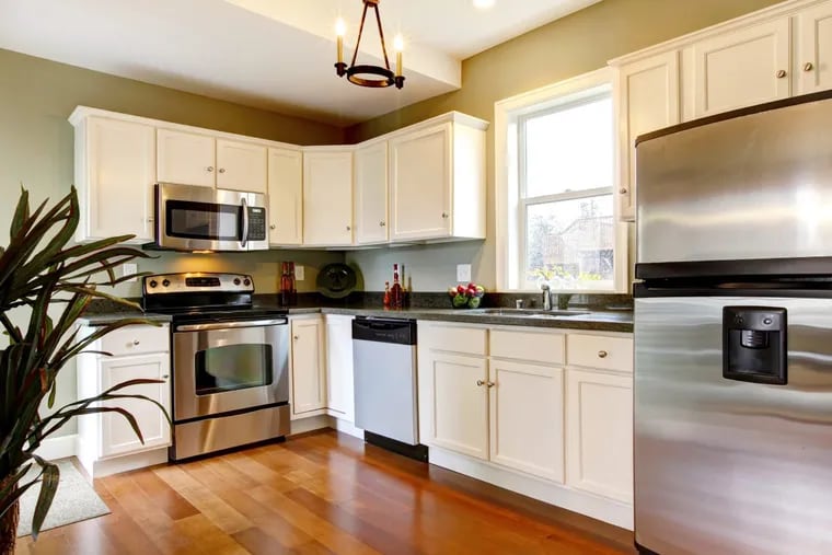 Traditionally there is 18 inches of space between counters and the cabinets, though many homeowners are opting for 20 inches in new kitchens. This is great for tall coffee makers and other appliances, but in my opinion, that’s still not enough space above the stove for a microwave and will make your cooking space feel cramped.