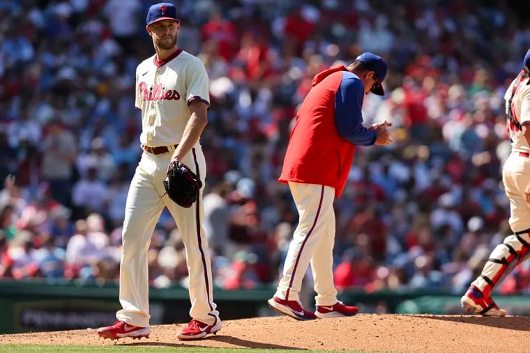 Philadelphia Phillies manager Rob Thomson pulls pitcher Zack Wheeler during the sixth inning of the Philadelphia Phillies game against the Pittsburgh Pirates at Citizens Bank Park in Philadelphia, Pa. on Sunday, April 14, 2024.