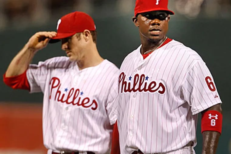 Chase Utley and Ryan Howard remain the heart of the Phillies' batting order. (Ron Cortes/Staff file photo)