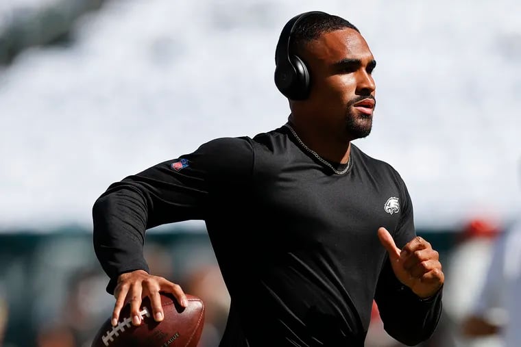 Eagles quarterback Jalen Hurts runs with the football during warm-ups before the Eagles play the San Francisco 49ers on Sunday, September 19, 2021 in Philadelphia.