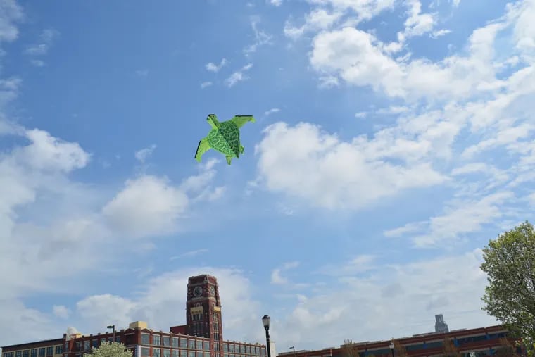 The Camden waterfront hosts a kite-making and kite-flying event as part of the Delaware River Festival.