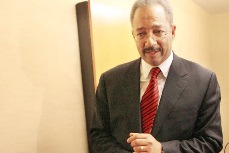 Democratic Mayoral candidate Chaka Fattah walks out of a meeting room after addressing local media members at the Sheraton Philadelphia City Center on Tuesday, May 15, 2007.  (Yong Kim / Philadelphia Daily News)