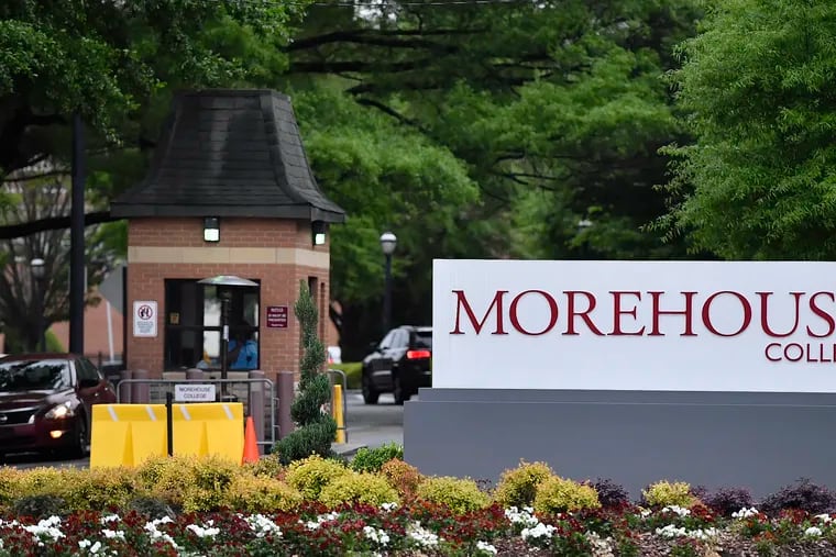 In this Friday, April 12, 2019 photo, people enter the campus of Morehouse College in Atlanta. The country's only all-male historically black college will begin admitting transgender men next year. The move marks a major shift for Morehouse College at a time when higher education institutions around the nation are adopting more welcoming policies toward LGBT students. Morehouse College leaders told The Associated Press that its board of trustees approved the policy Saturday.