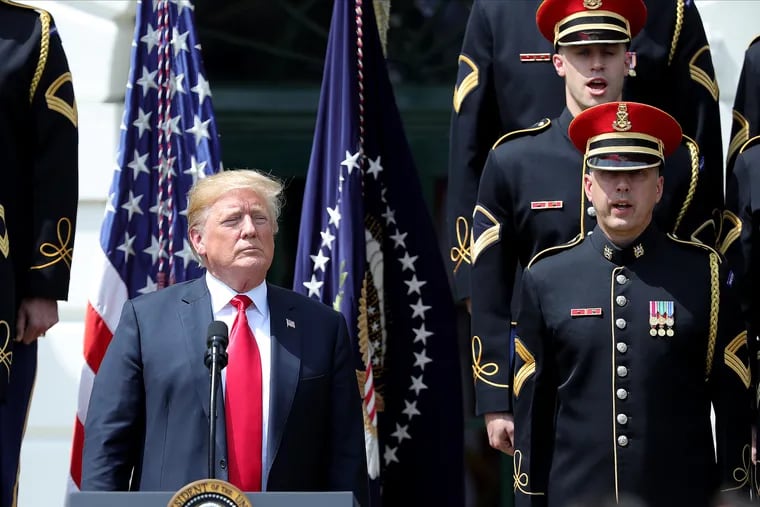 President Donald Trump listens during the "Celebration of America"  event at the White House that was held in June 2018 in place of the ceremony honoring the Super Bowl champion Eagles.