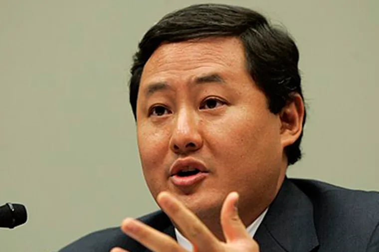 In this June 26, 2008 file photo John Yoo, a law professor at the University of California at Berkeley, testifies on Capitol Hill in Washington. Justice Department officials have stopped short of recommending criminal charges against Bush administration lawyers who wrote secret memos approving harsh interrogation techniques of terror suspects. (AP Photo/Susan Walsh, File)