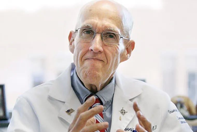 Dr. Joseph Majdan took a lot of ribbing over the years for being a fat cardiologist by his colleagues. Now thin after losing an undisclosed amount of weight, he's written a tell-all in an essay published by the Annals of Internal Medicine. (Elizabeth Robertson / Staff Photographer)