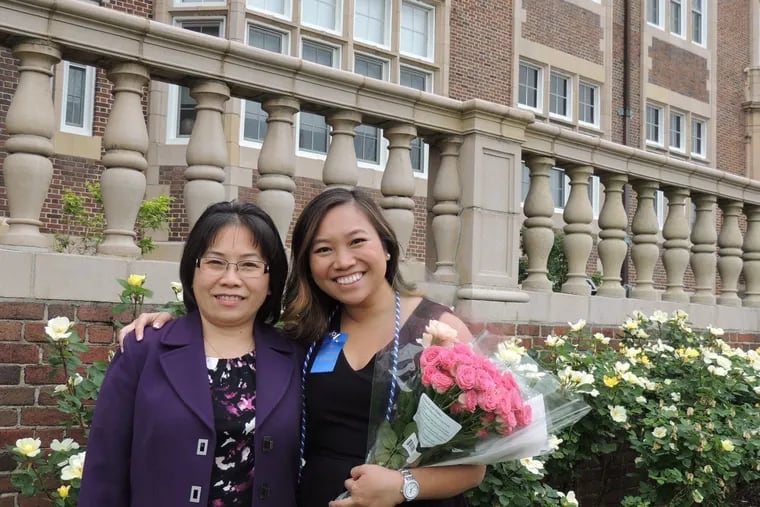 Tuyet Le stands with her daughter, Kimberly Ho.
