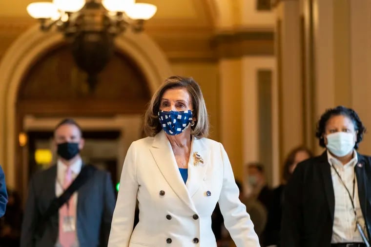 House Speaker Nancy Pelosi of Calif., walks from the House floor, during the vote on the Democrat's $1.9 trillion COVID-19 relief bill, on Capitol Hill on March 10.