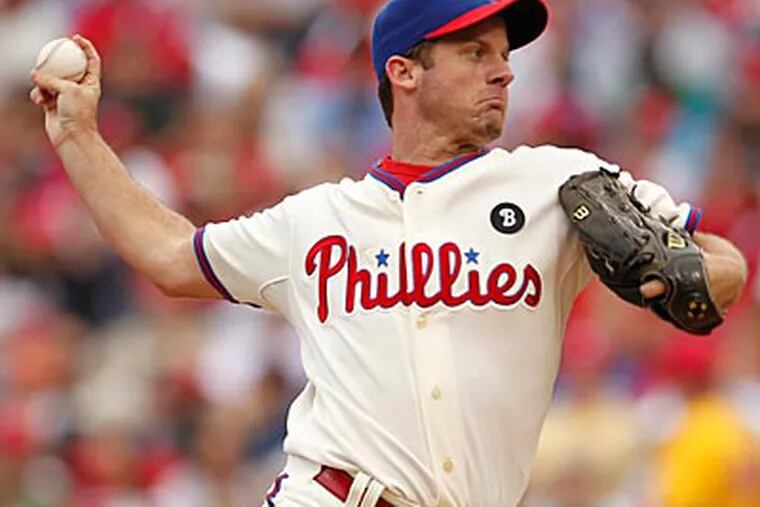 Roy Oswalt left Wednesday's start after only two innings with back tightness. (Ron Cortes/Staff file photo)