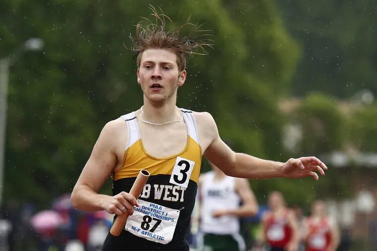 Brian Baker of Central Bucks West completes the anchor leg as the Bucks win the 4×800-meter relay in Class 3A at the PIAA District 1 track and field championships on Saturday at Coatesville.