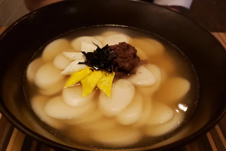 Tteokguk, a traditional Korean rice cake soup.