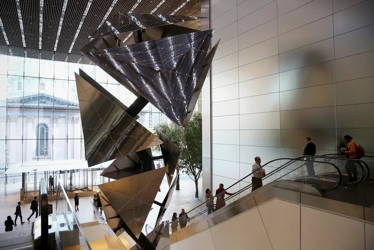 "Exploded Paradigm" by artist Conrad Shawcross greets visitors in the lobby of the new Comcast Technology Center in Center City.