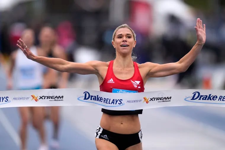Allie Wilson celebrates as she wins the invitational women's 800-meter run at the Drake Relays athletics meet on April 30 in Des Moines, Iowa. Wilson is slated to run in the Olympic development 800-meter run at the Penn Relays.