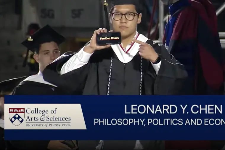 University of Pennsylvania graduate Leo Chen, 22, made a splash at his commencement ceremony when he flashed "Fire Doc Rivers" on his phone.