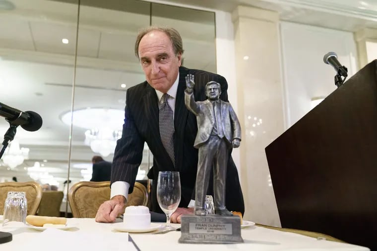 Temple University basketball coach Fran Dunphy shown here with the 2018 Dean Smith Award given to him by the U.S. Basketball Writers Association, at the Hilton Hotel in Philadelphia, November 1, 2018. As PhiladelphiaÕs six NCAA Division I menÕs basketball coaches and the American Cancer Society host the 7th annual preseason college basketball preview lunch. JESSICA GRIFFIN / Staff Photographer