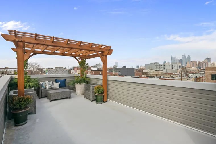 A roof deck has been added to 1405 S. Clarion St., an updated rowhouse in South Philadelphia.