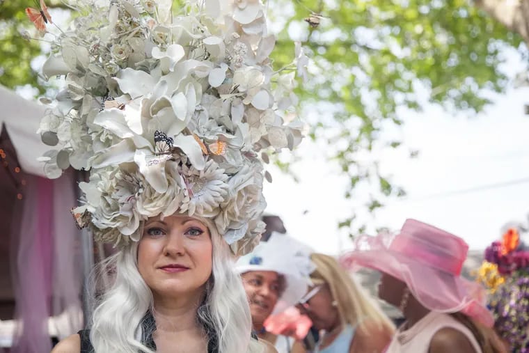 Joy Mossholder Sporn, of Devon, helped her group bring home “Best Group” with her take on the White Queen from Alice in Wonderland at the 8th Annual Hat Contest during Ladies Day at the Devon Horse Show.