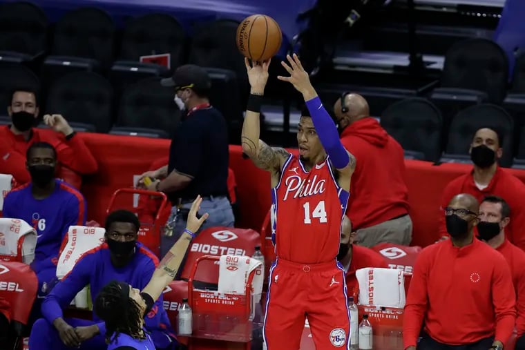Sixers forward Danny Green shoots the basketball past Orlando Magic guard Cole Anthony on Friday, May 14, 2021.