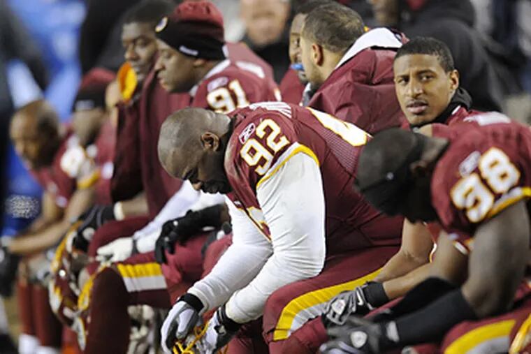 Redskins defensive tackle Albert Haynesworth sits on the bench during Monday's 45-12  loss to the Giants. (AP Photo/Nick Wass)