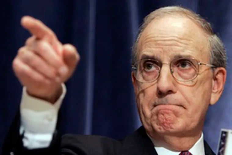 Former Sen. George Mitchell addresses questions from reporters after presenting his report on steroid use in baseball.