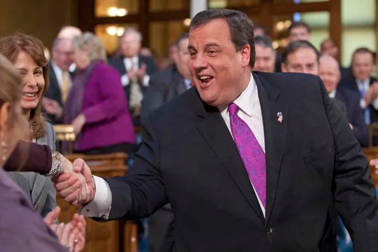 N.J. Gov. Chris Christie greets the legislature after delivering his budget address in the assembly chamber of the State House on Tuesday. (David M Warren / Staff Photographer)