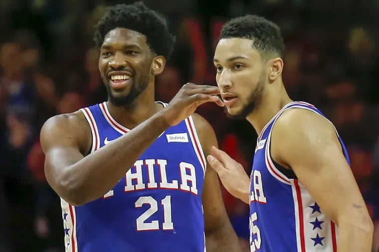Sixers center Joel Embiid with teammate Sixers guard Ben Simmons are fighting for spots in the all-star game.